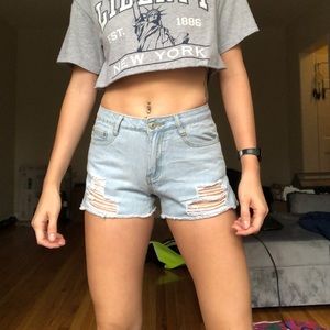 Distressed denim shorts
